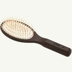Wooden hairbrush with light bristles