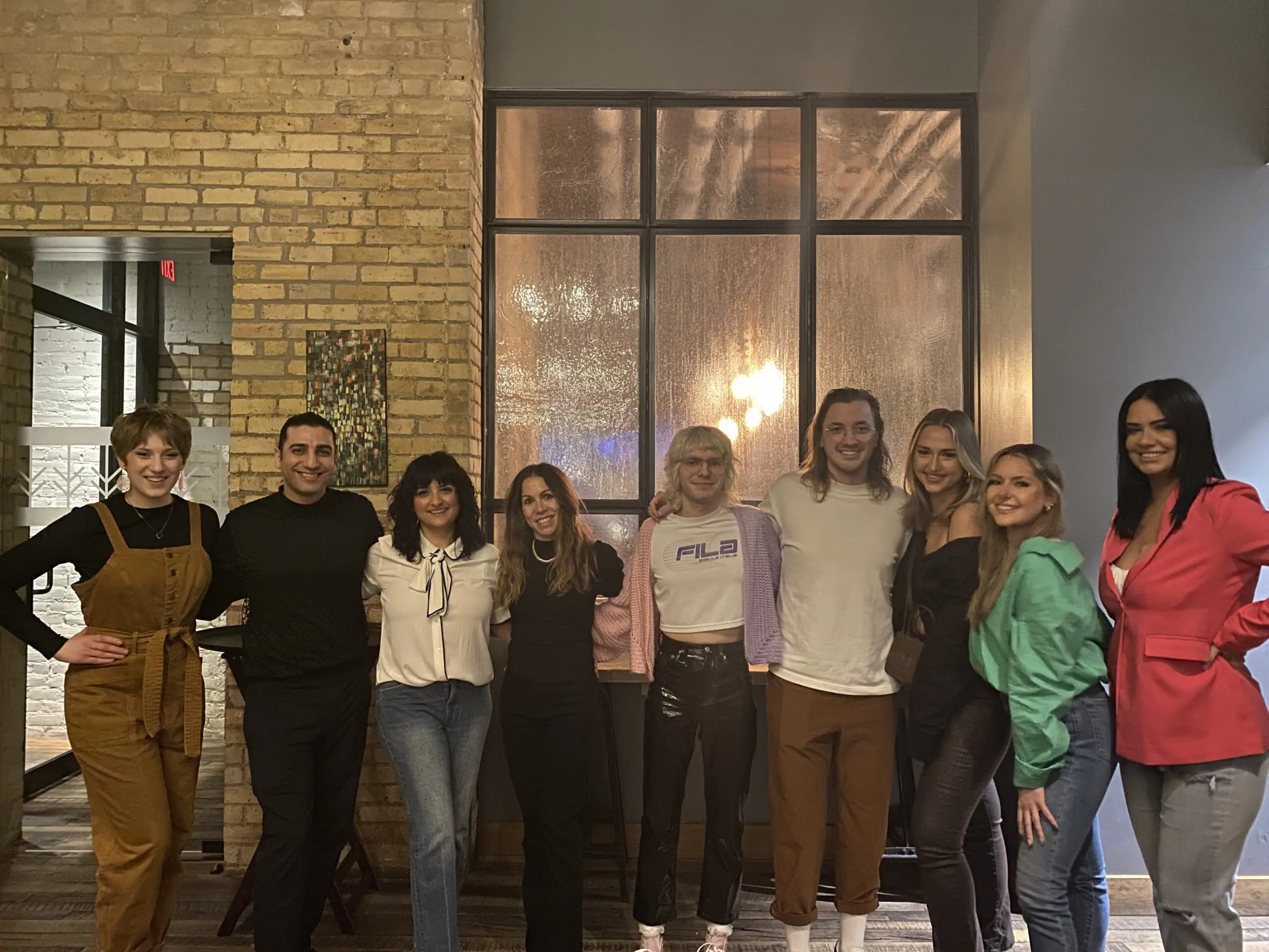 Group of friends posing indoors