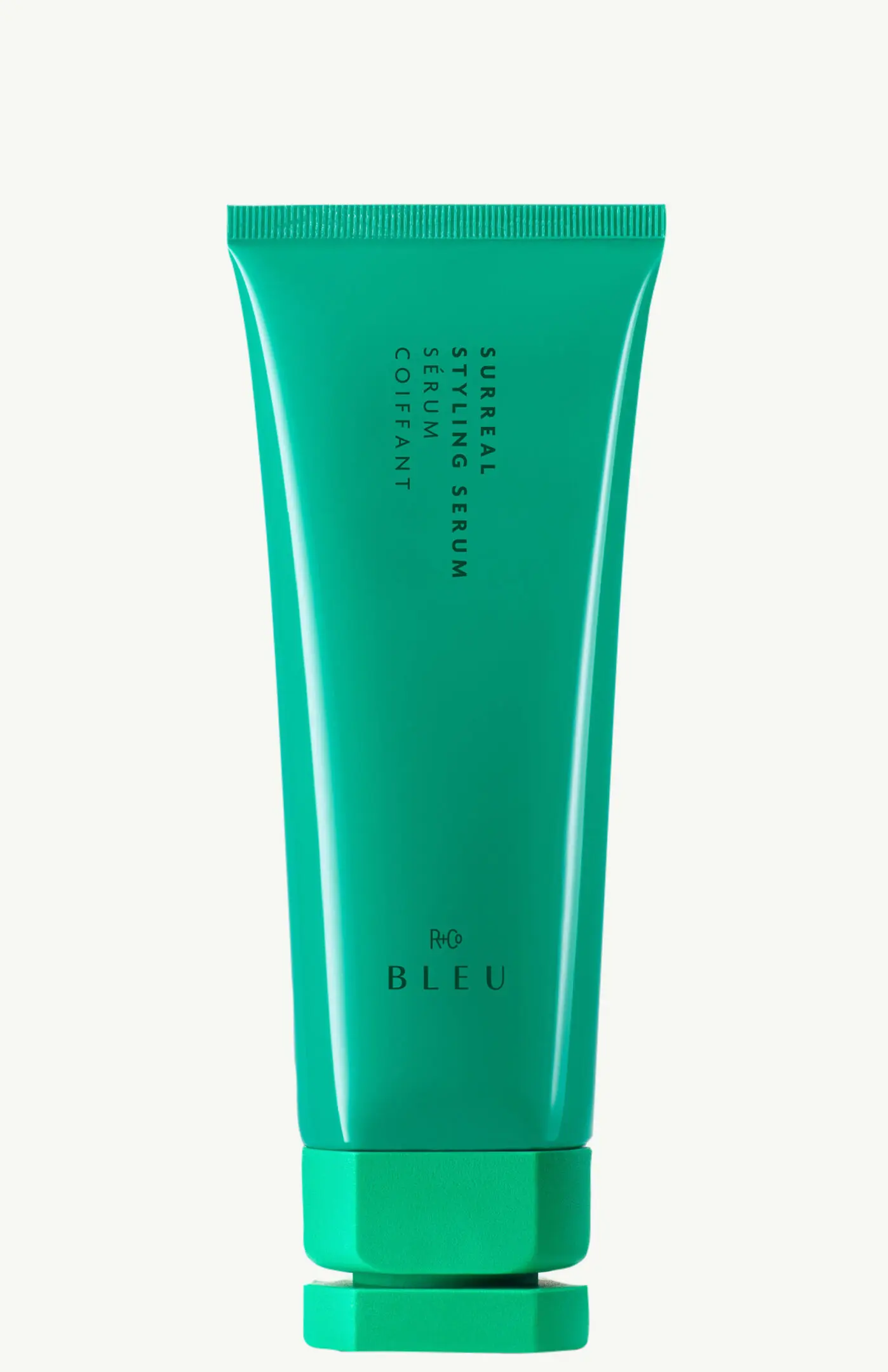 Hair styling product in green packaging.