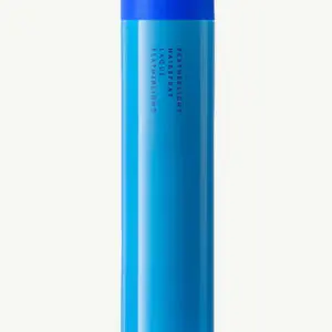 Sleek blue bottle on white background