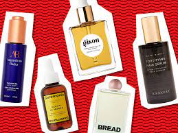 Skincare and haircare products on red background